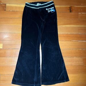 2000’s juicy couture black velour flare pants with a low rise